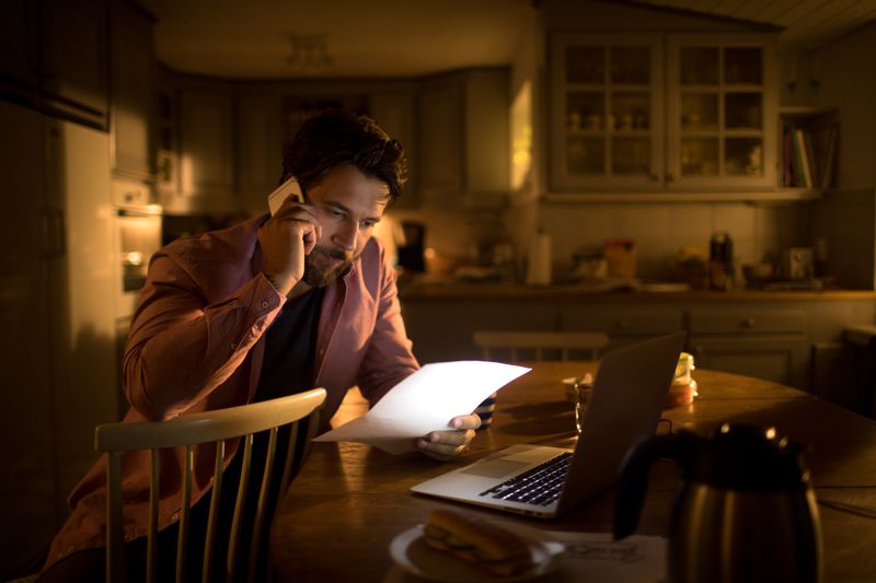 Man looking at credit report