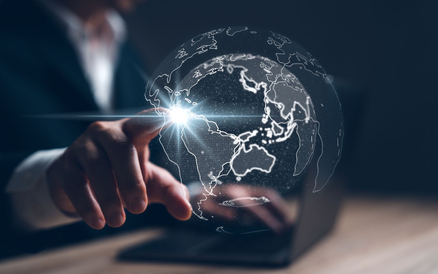 A foreign security issuer touches the image of a globe and causes a spark to ignite.
