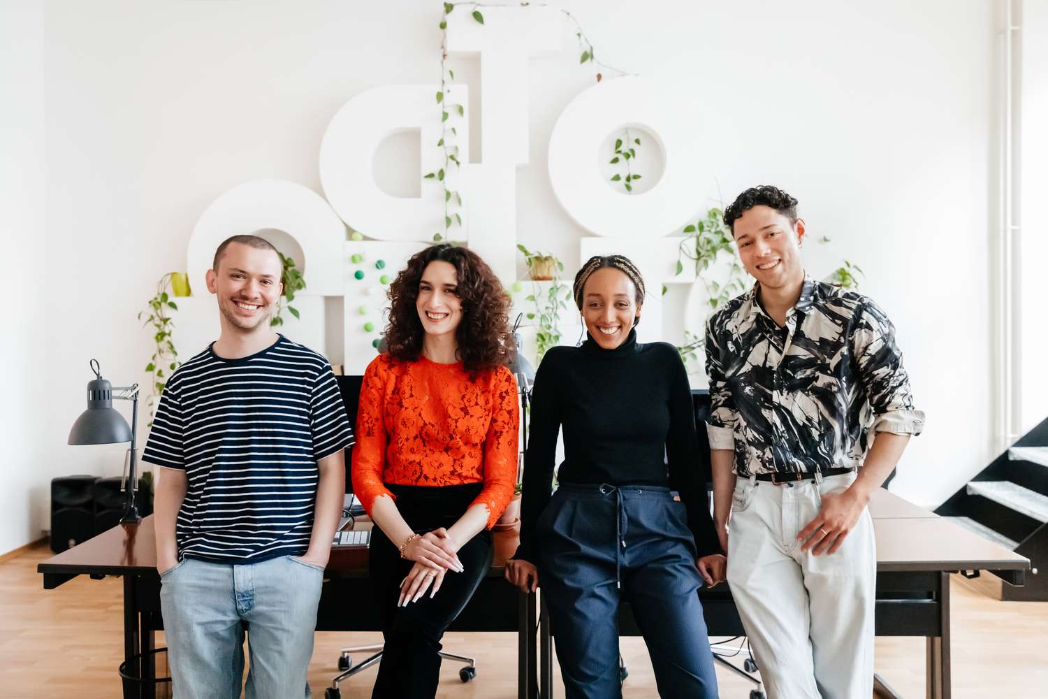 Portrait of a business team wearing casual clothes in a modern office