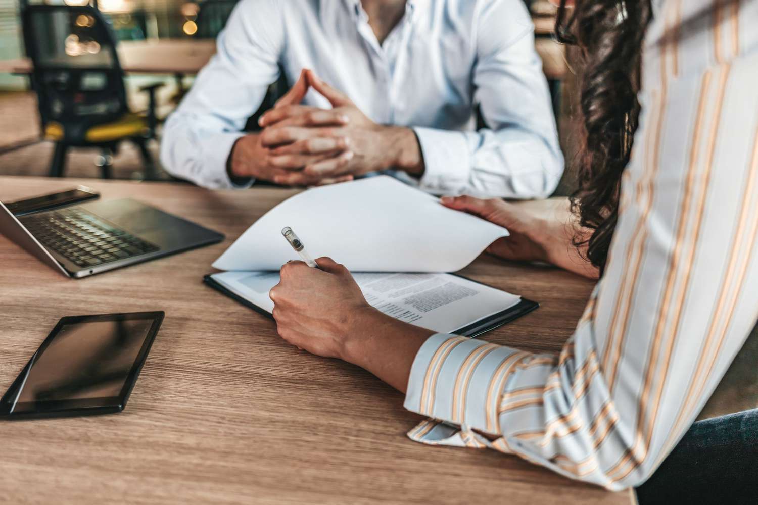 Businesspeople negotiating a contract