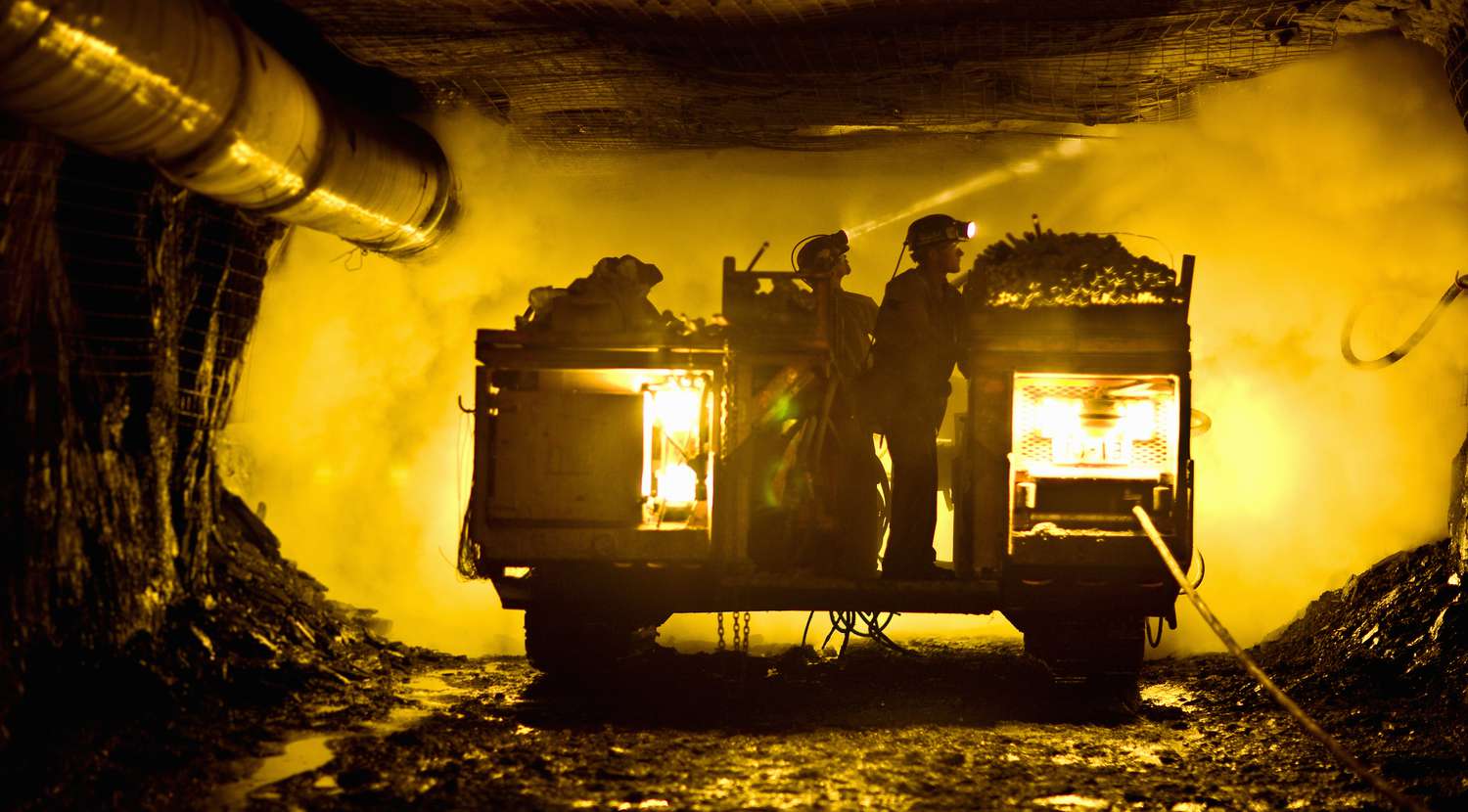 Coal miners in a mine shaft