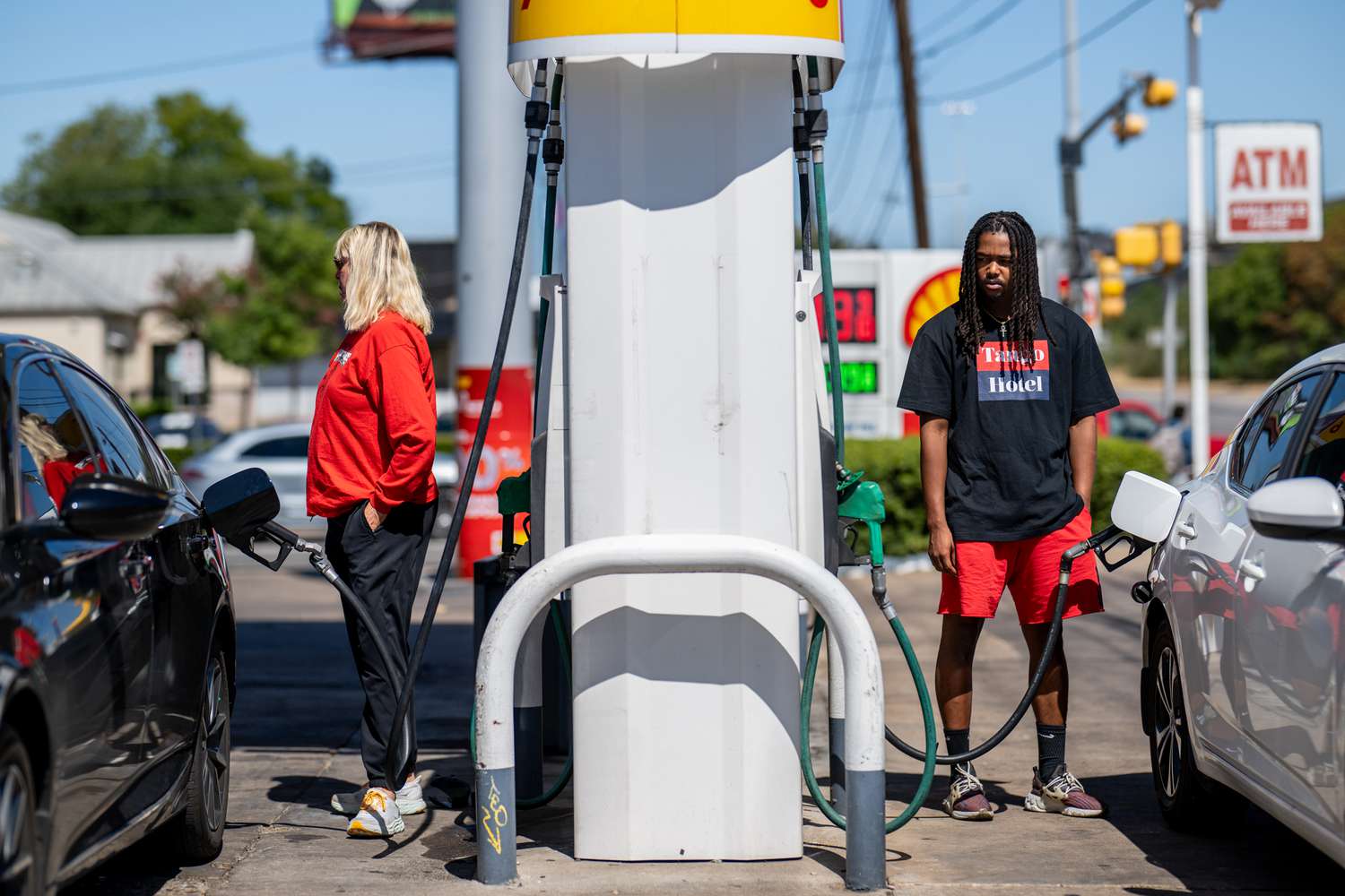 People pump gas at a Shell gas station on August 03, 2023 in Austin, Texas. Gas stations around the country have boosted prices by an average of 26 cents a gallon over the past month as irregular temperatures have made fuel-making more challenging due to the slowing of cooling processes needed to refine crude oil.