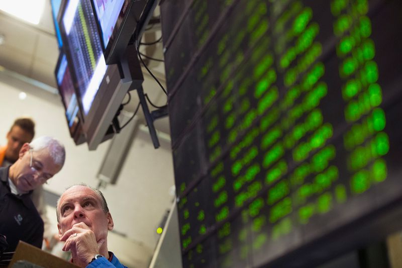 A trader monitors offers in the Standard & Poor's 500 stock index options pit at the Chicago Board Options Exchange