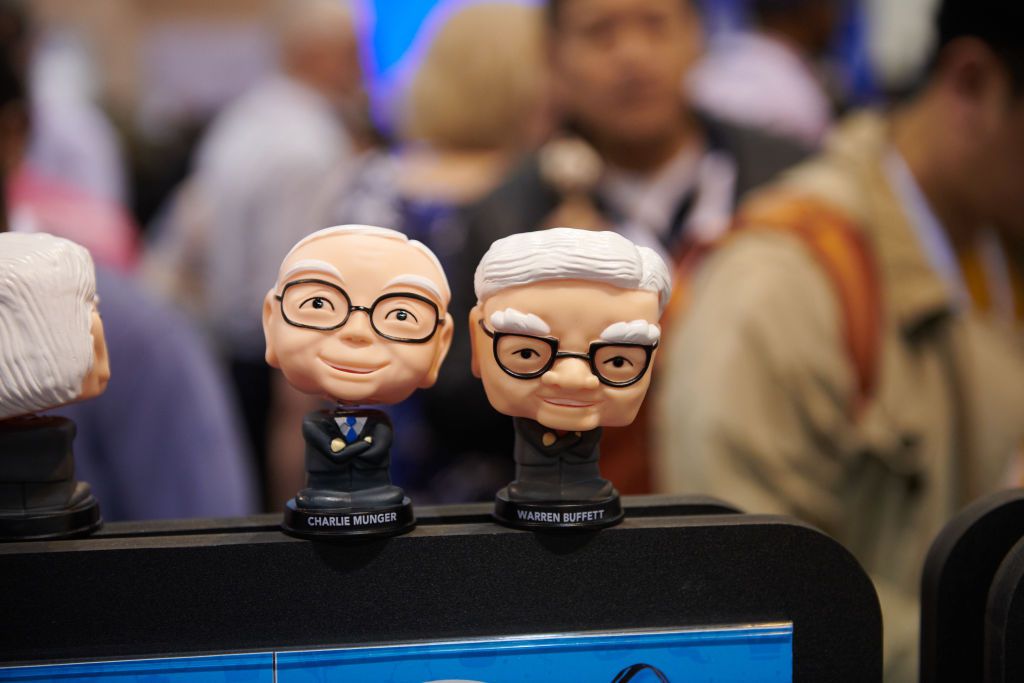 Bobbleheads depicting Berkshire Hathaway CEO Warren Buffet and former Vice Chairman Charlie Munger during a shareholders shopping day ahead of the Berkshire Hathaway annual shareholders meeting in Omaha, Nebraska, US, on Friday, May 3, 2024. 