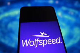 Wolfspeed logo is displayed on a smartphone