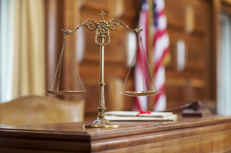 Scales of justice on the judgeÕs bench