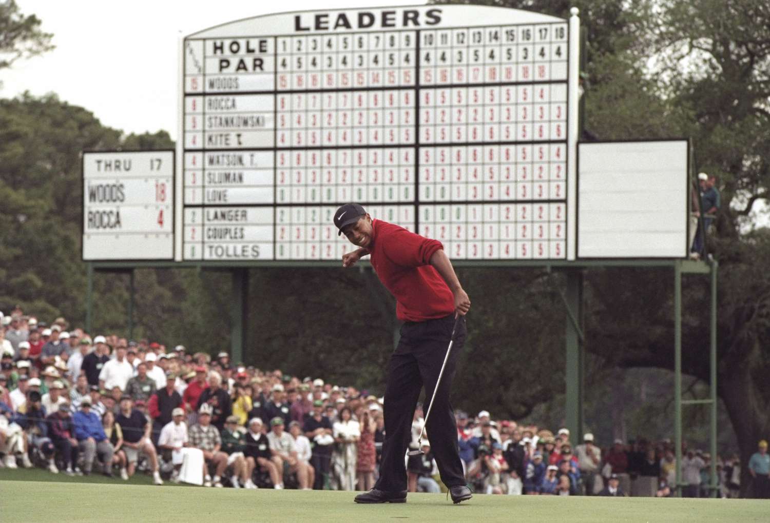 Tigers Woods hits a four foot putt on the 18th hole to win the Masters Tournament at the Augusta National Golf Course in Augusta, Georgia