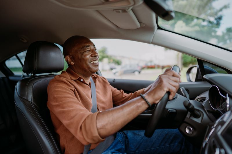 A man drives a car