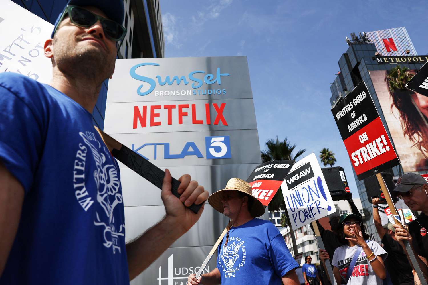 Striking WGA (Writers Guild of America) members picket with striking SAG-AFTRA members outside Netflix studios 