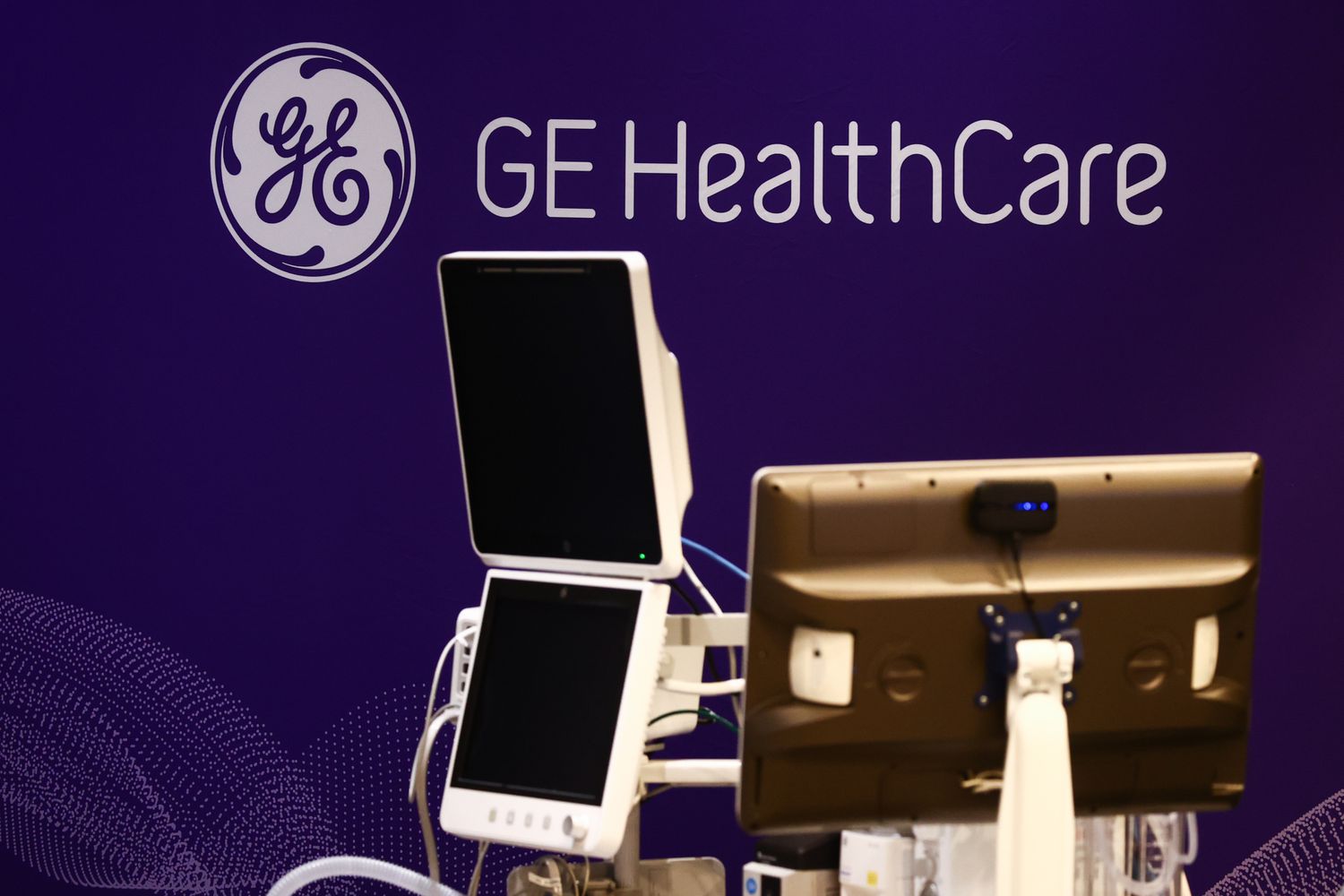 GE HealthCare logo and medical equipment