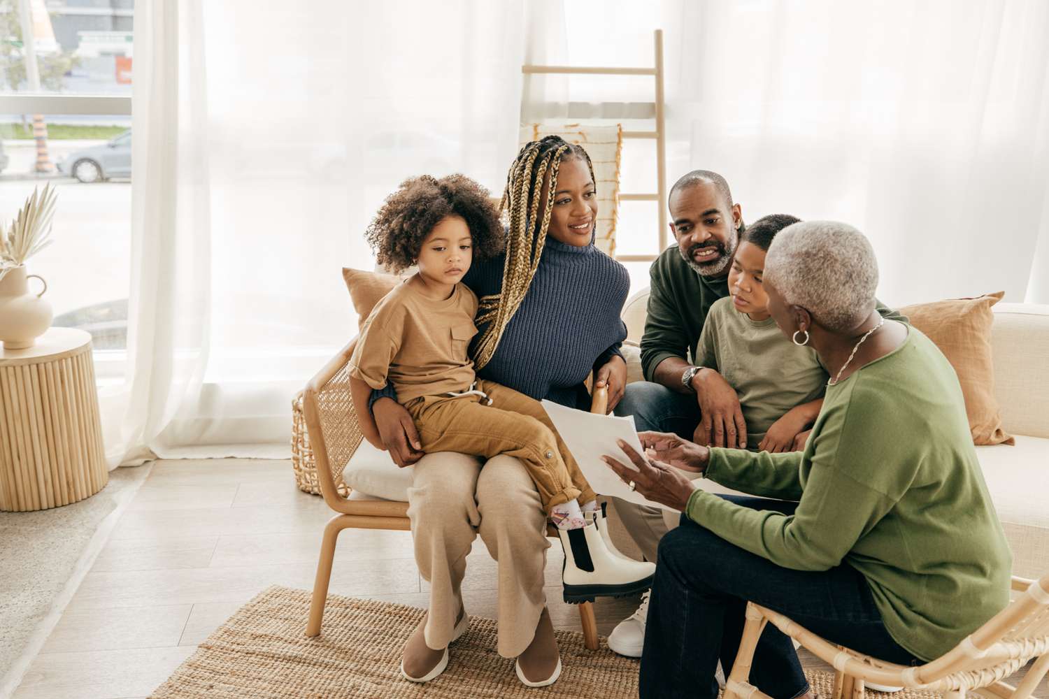 Three generations of a family meeting with a financial planner.