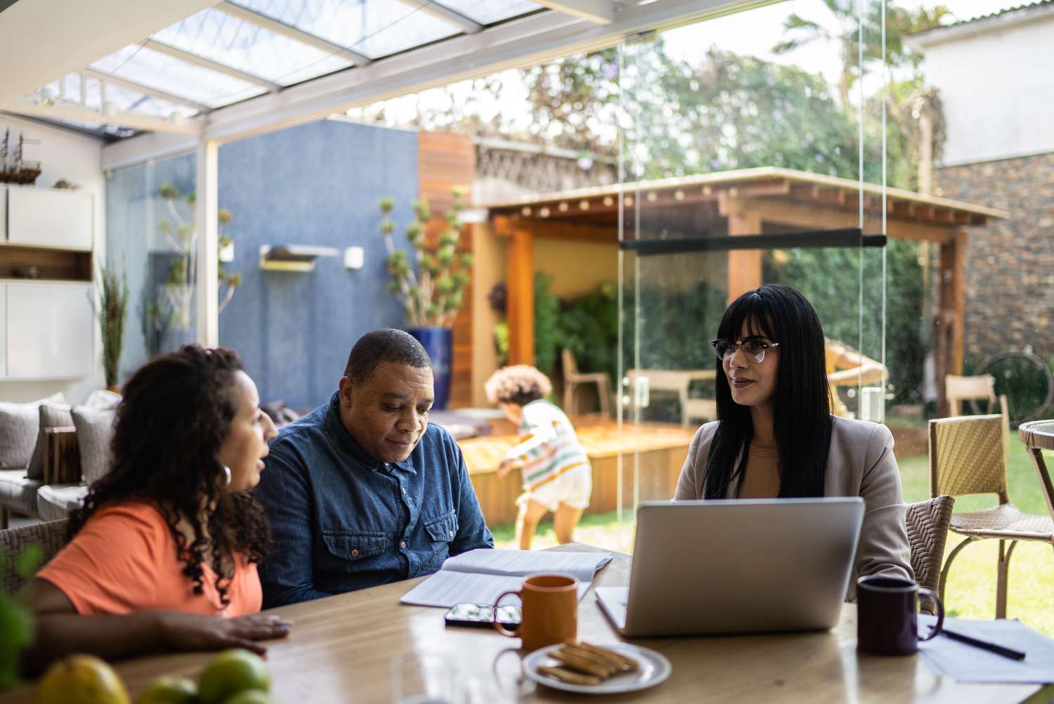 Professional consultant is making a workout agreement with borrowers in regard to their mortgage loan.