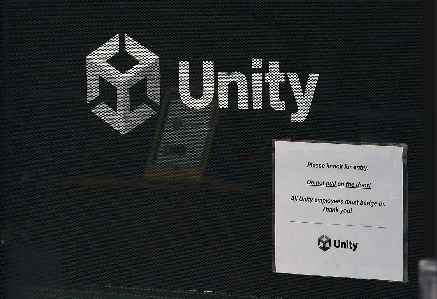 The Unity Software logo is displayed outside of the Unity Software headquarters.