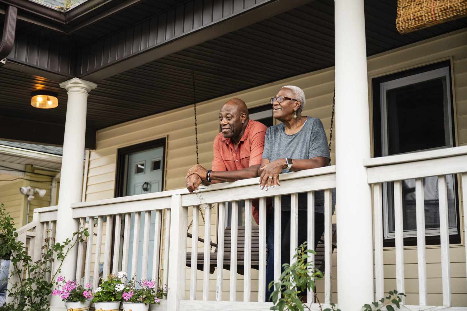 Older couple enjoying their new home after finding out how to find the best mortgage rates.