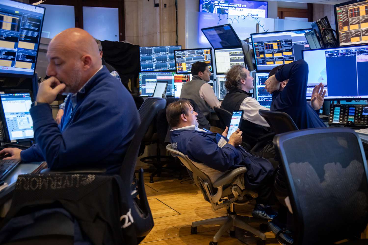 Traders work on the floor of the New York Stock Exchange