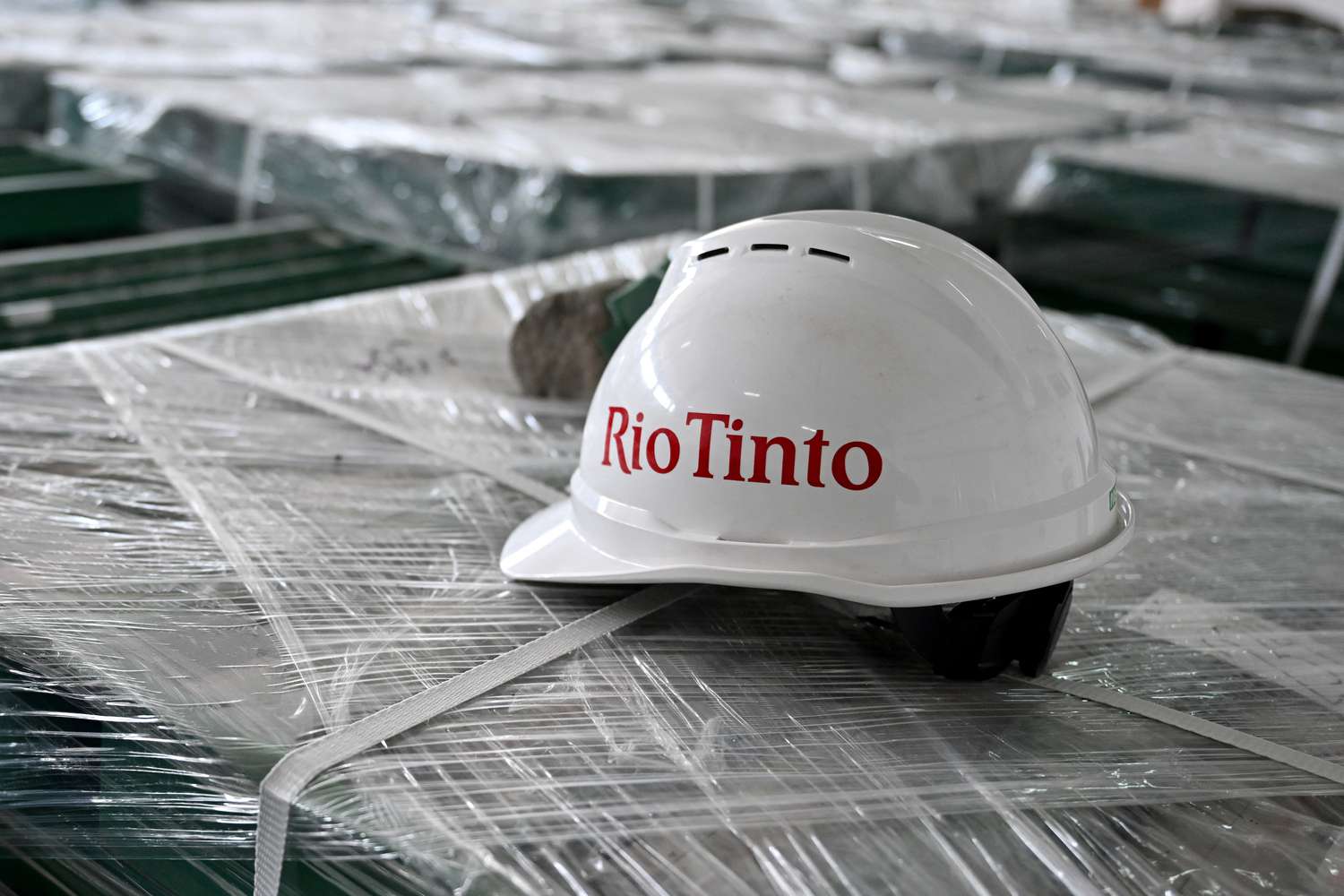 A safety helmet with a 'Rio Tinto' logo