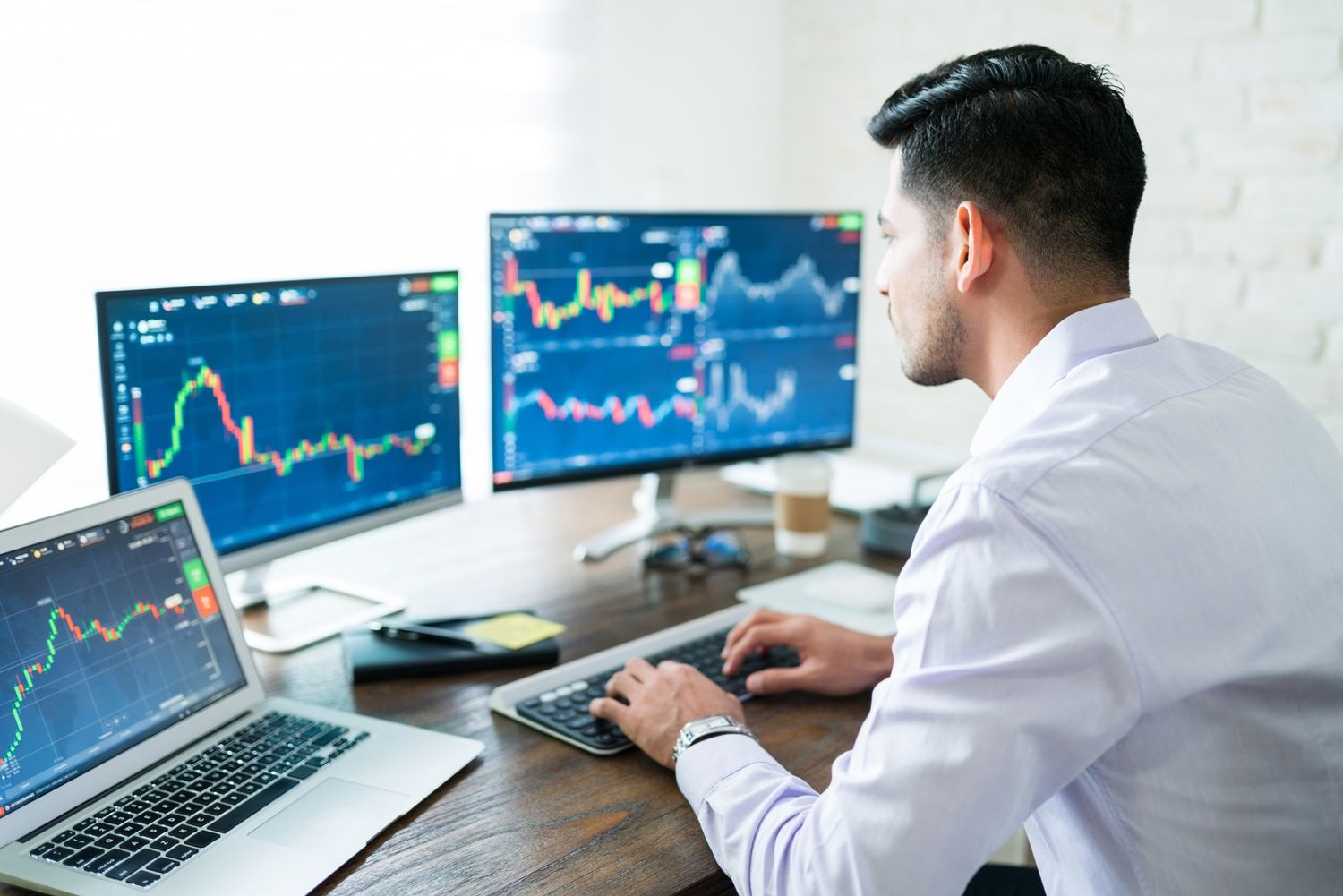 An analyst uses candlestick charting to identify breakout in stock prices and volume.