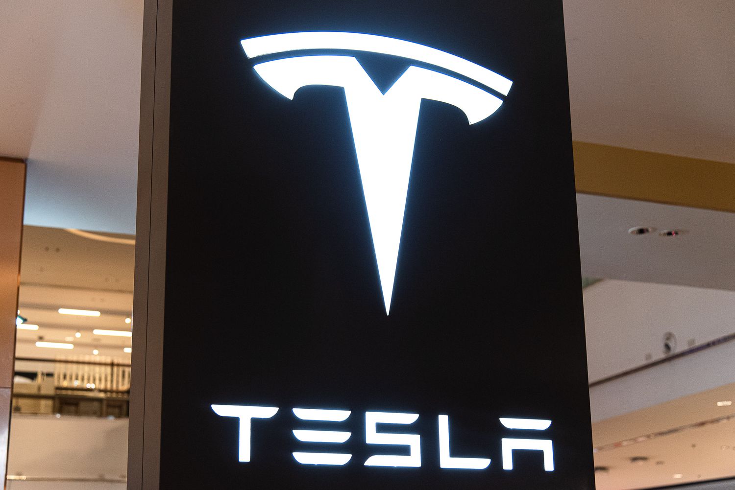 A Tesla logo seen during an event a shopping mall in Bangkok, Thailand