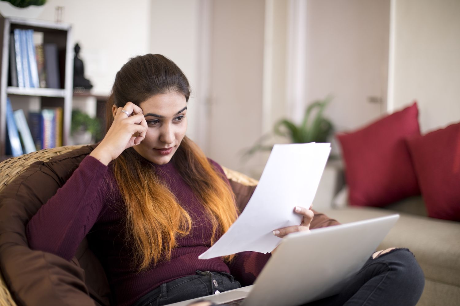 Woman looking at paper