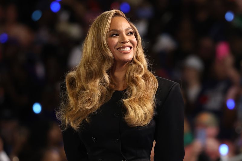 Beyonce looks on during a campaign rally with Democratic presidential nominee