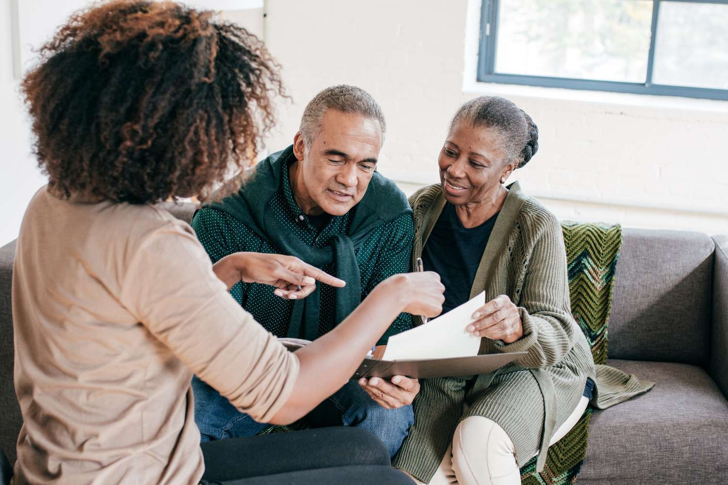 Older adults discussing finances 