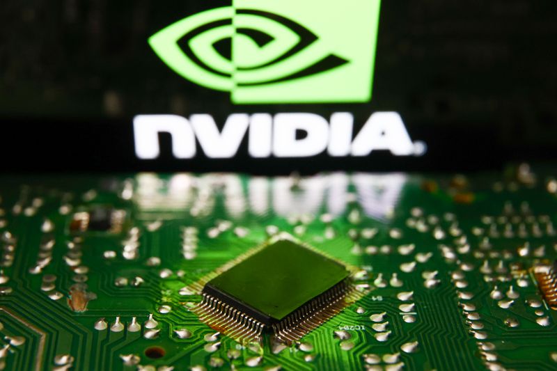 A close-up of a microchip in front of a Nvidia logo