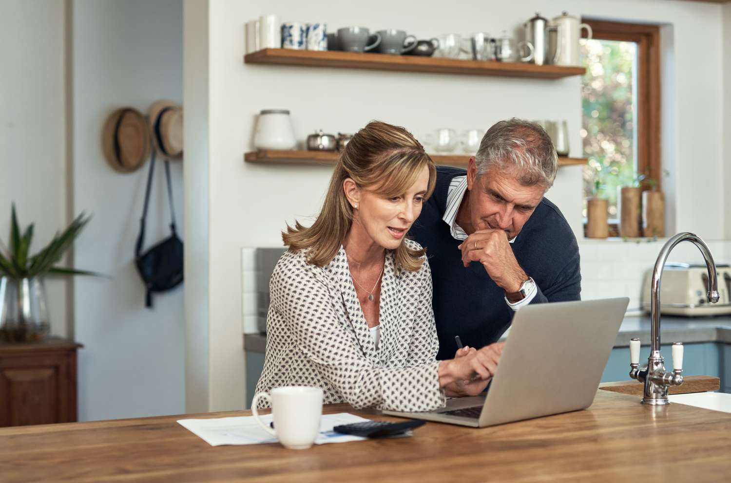 Couple comparing rates
