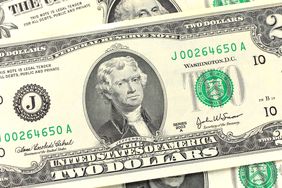 A close-up of a U.S. two-dollar bill featuring a portrait of Thomas Jefferson