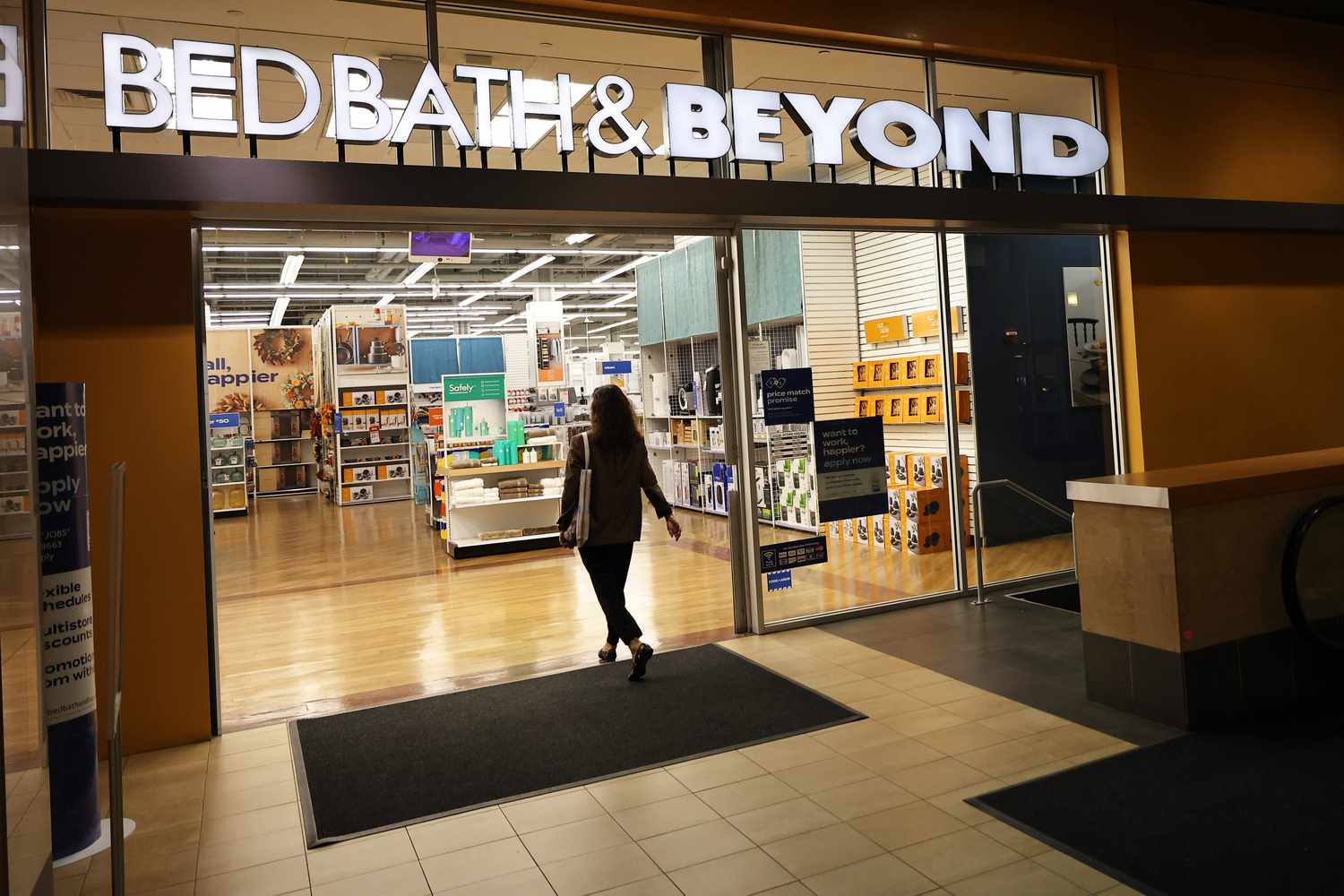 Person walking into a Bed Bath and & Beyond