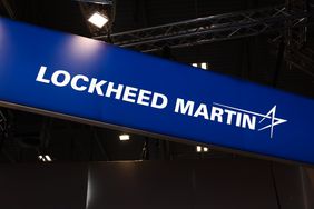 Lockheed Martin logo at a defense industry exhibition.