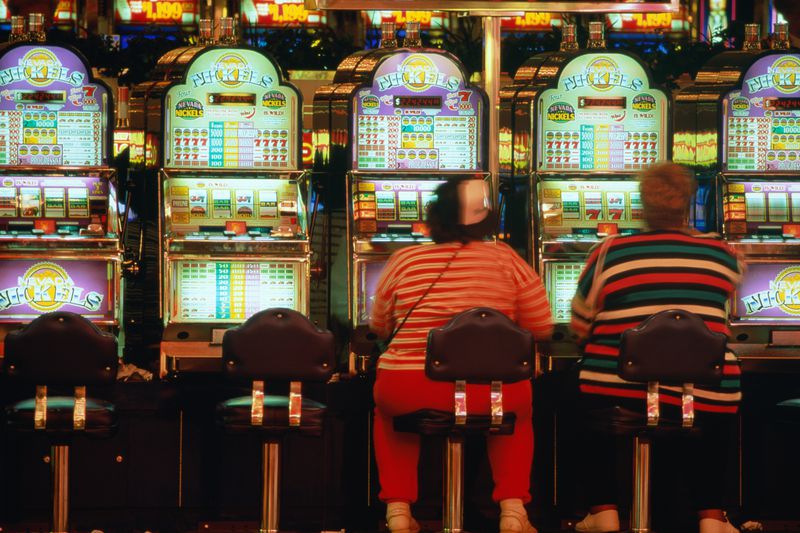 People playing slot machines at the casino in Las Vegas.