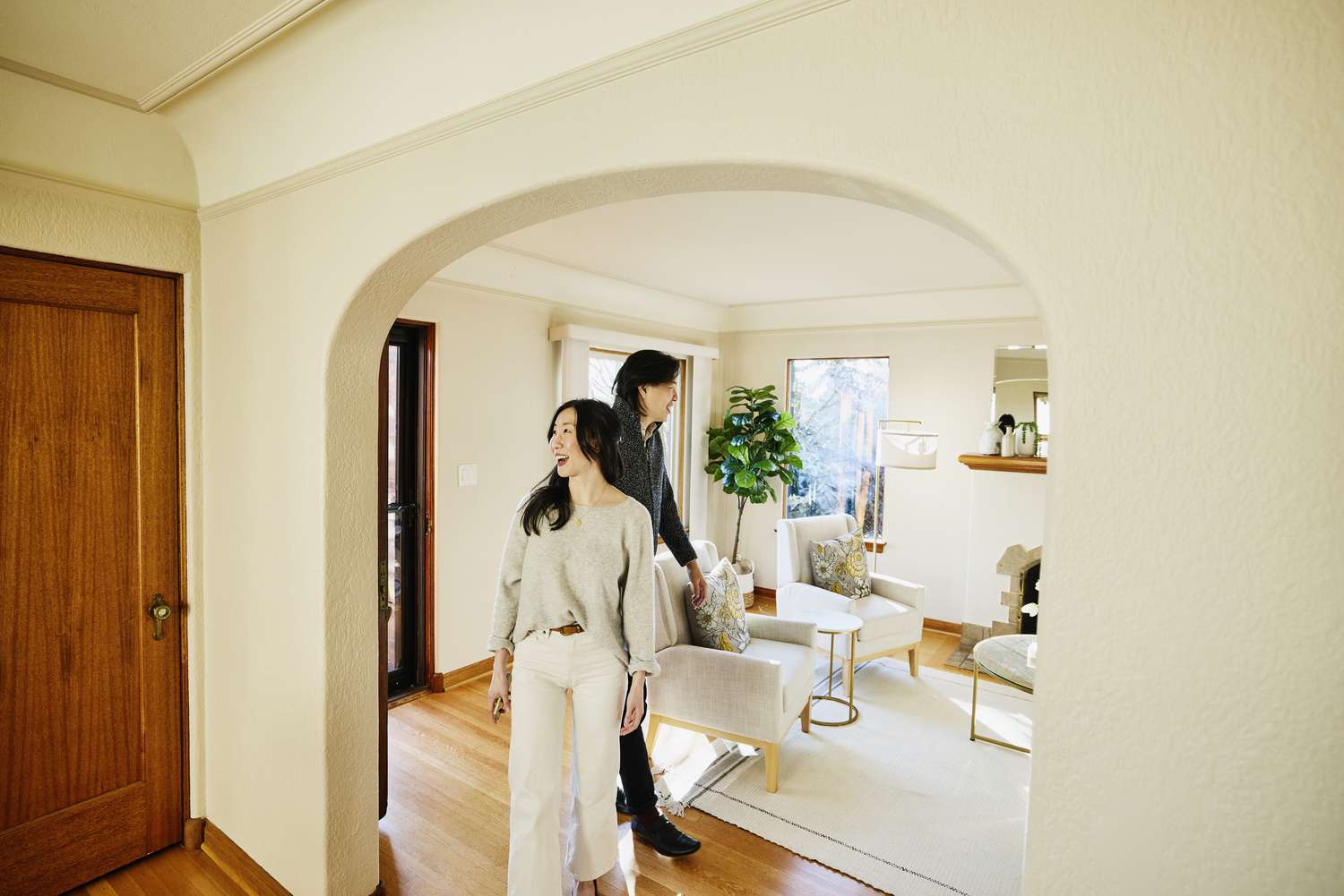 A couple tours a for-sale home.