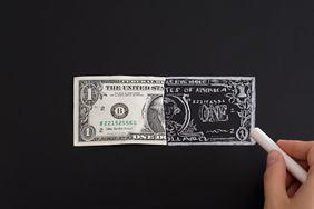 $1 bill with half looking fake