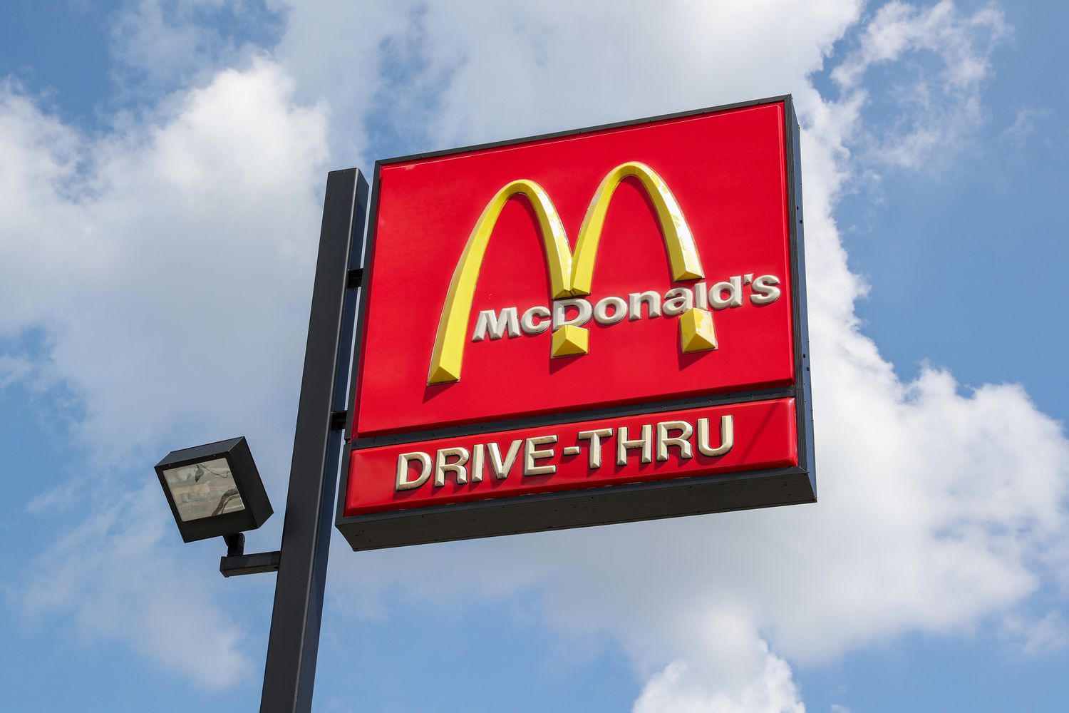 The McDonald's logo is seen on a sign outside the fast food restaurant
