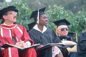 Culturally diverse faculty in formal robes at a graduation, UCLA, Los Angeles, CA 