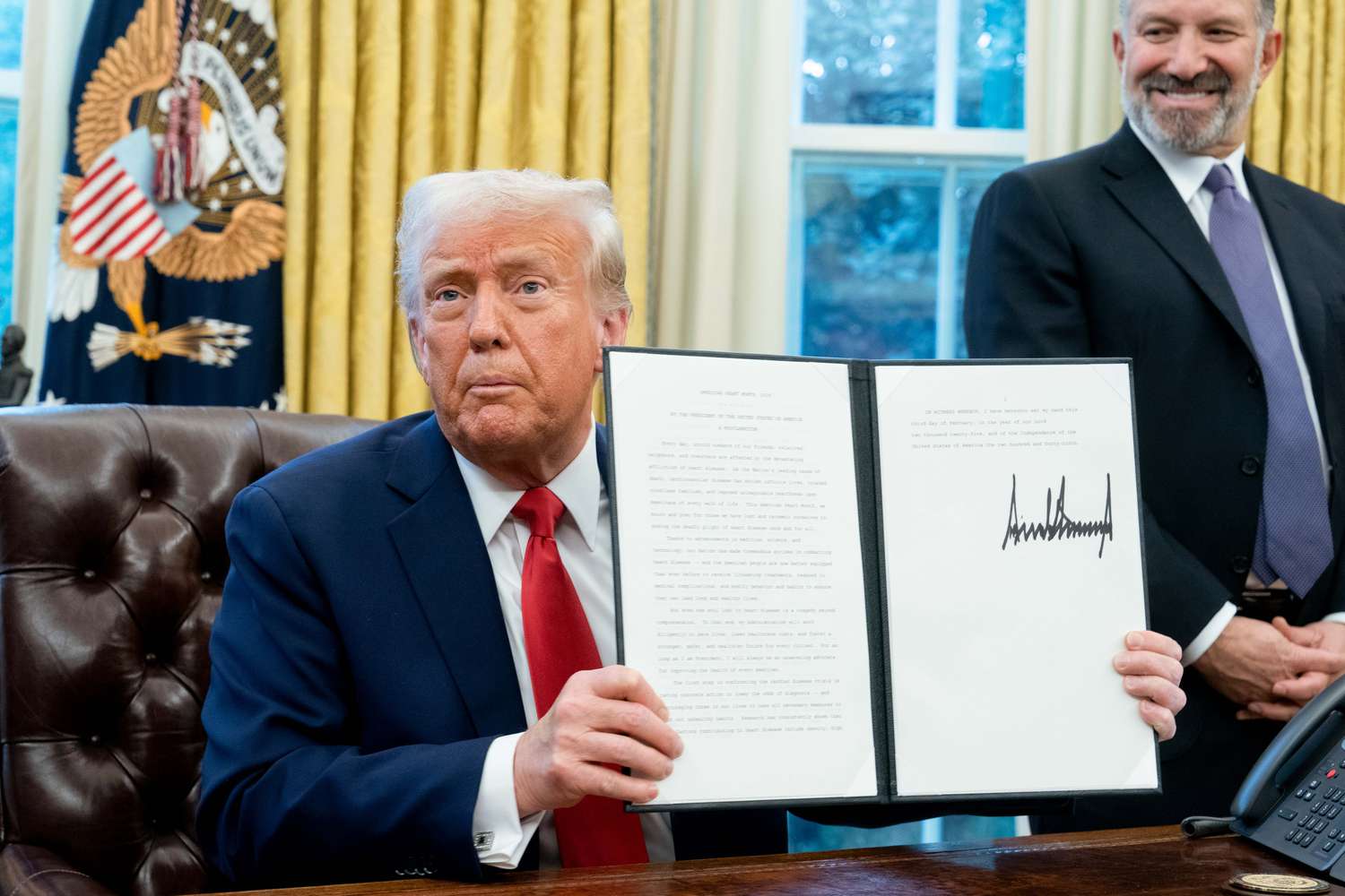 Trump signed an executive action he said would direct officials to create a sovereign wealth fund for the US