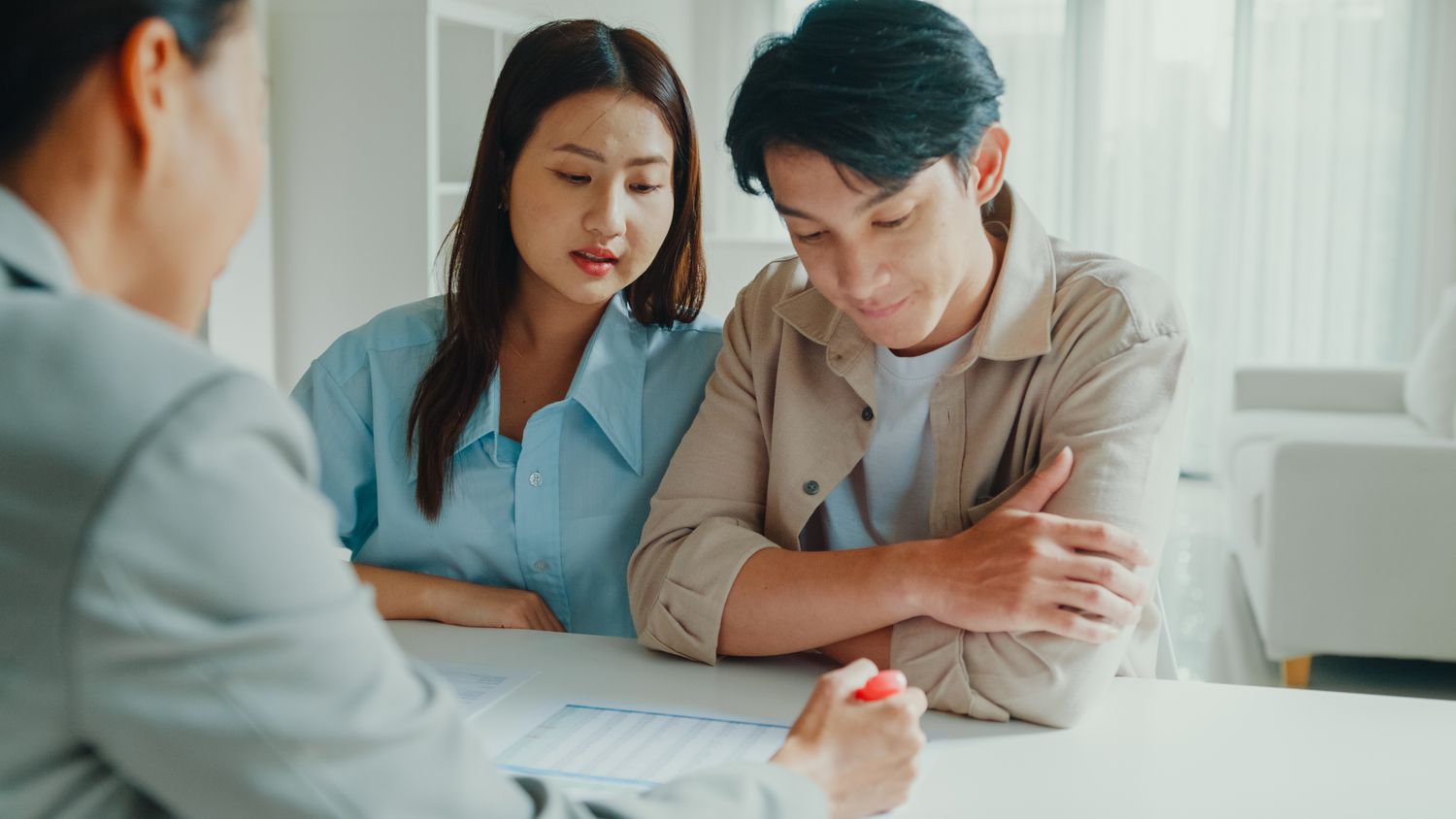Couple reviewing their student loan repayment options.