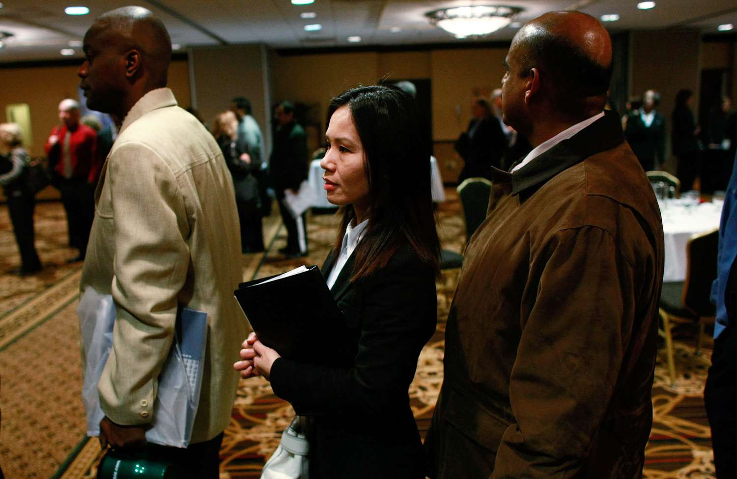 People waiting in line at a career fair