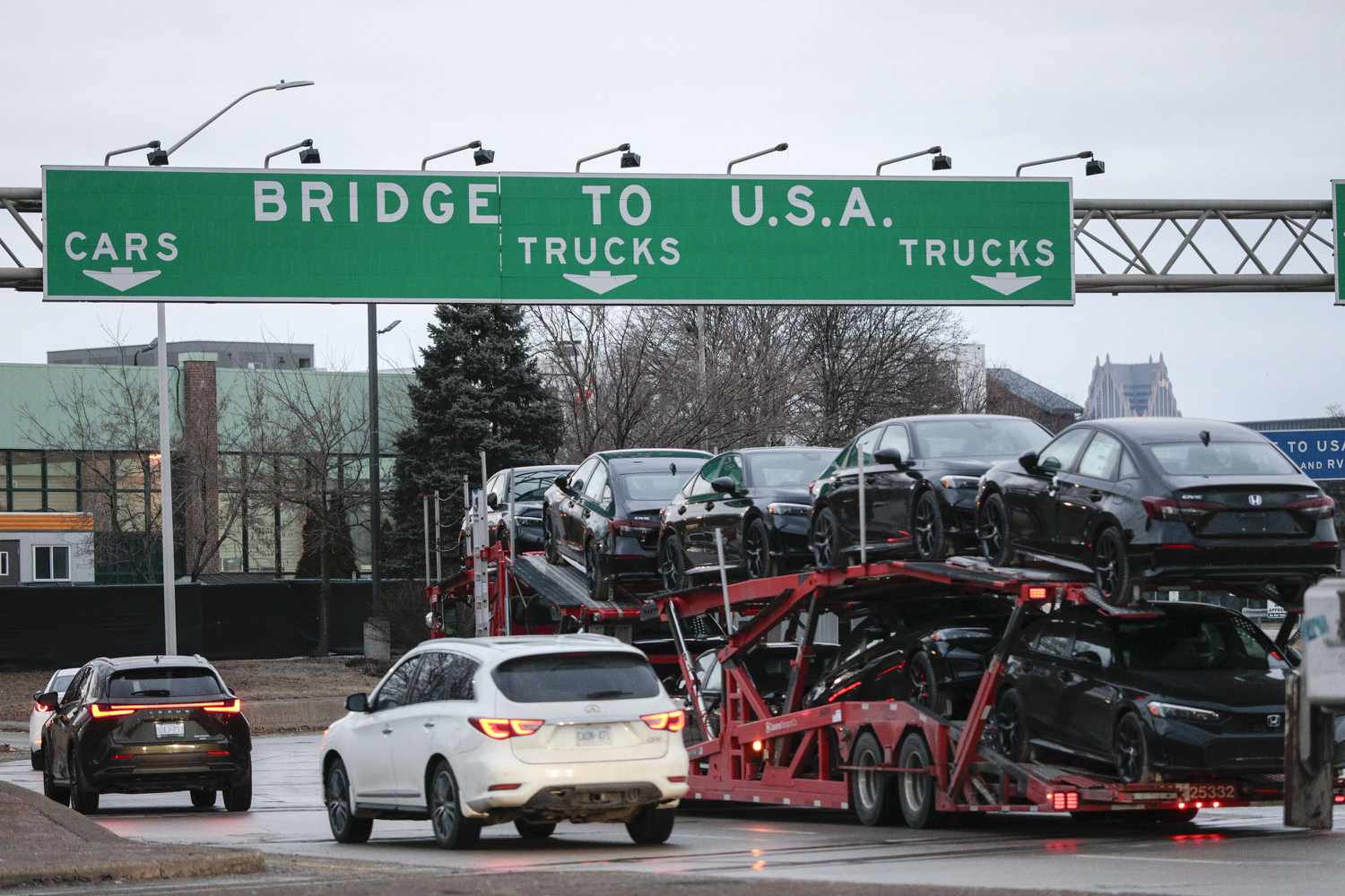  A car hauler heads to cross the Ambassador Bridge between Windsor, Canada and Detroit