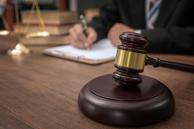 gavel on desk in courtroom