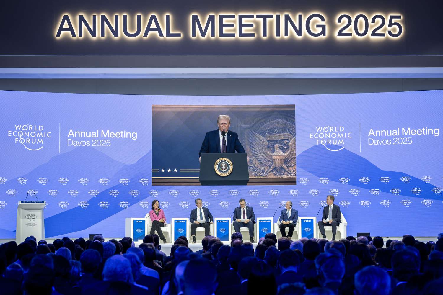 US President Donald Trump is seen on a giant screen during his address by video conference at the World Economic Forum (WEF) annual meeting in Davos on January 23, 2025.