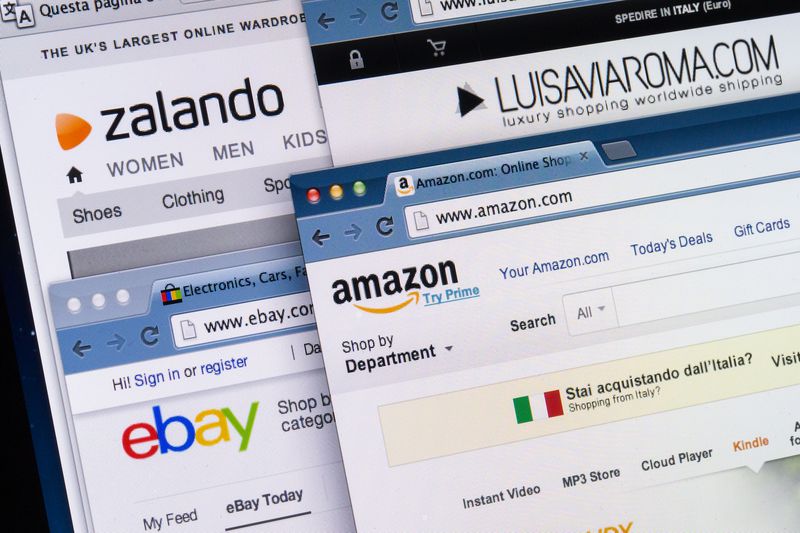 A close-up of Online shopping web sites on computer screen including Amazon, eBay, Zalando, Luisa Via Roma.