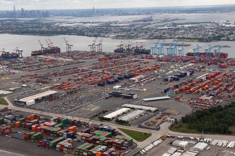Cargo ships are unloaded at the Maher Container Terminal and APM Terminal on Newark Bay across from lower Manhattan in New York City on June 1, 2025, in Newark, New Jersey.