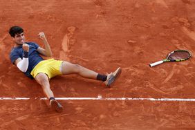 Carlos Alcaraz of Spain celebrates winning match point against Alexander Zverev of Germany during the Men's Singles Final match on Day 15 of the 2024 French Open at Roland Garros on June 9, 2024 in Paris, France