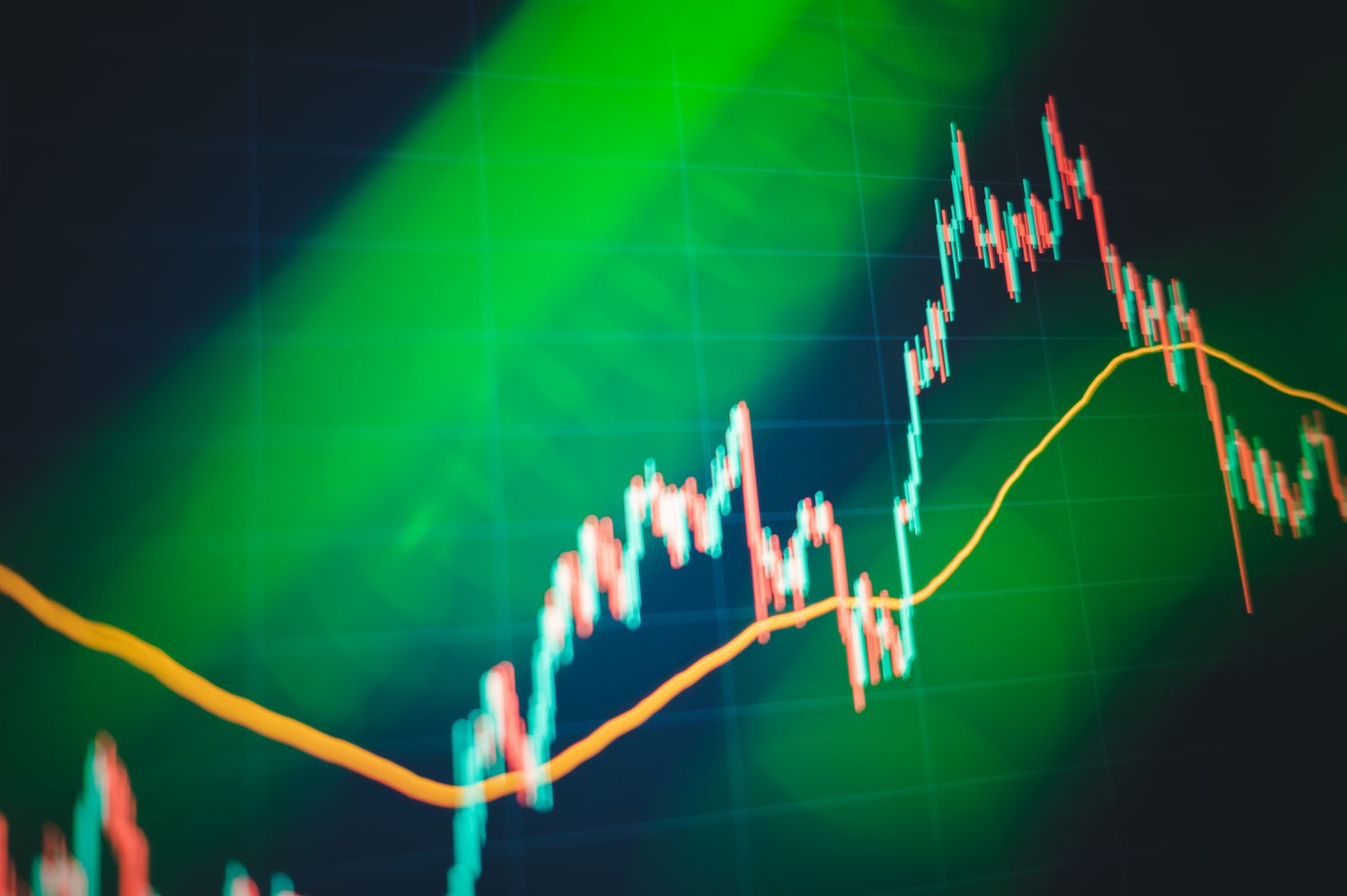 A digital screen showing a graph of cryptocurrency price volatility.
