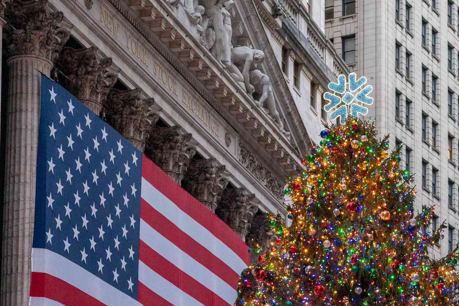An American flag is displayed on the outside the New York Stock Exchange